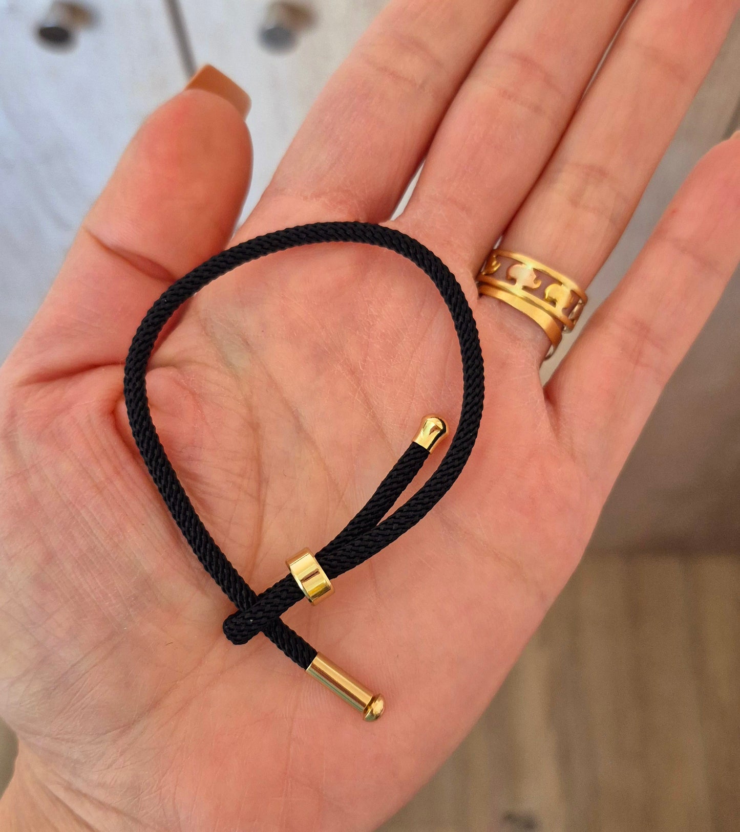 Pulsera cordón negro