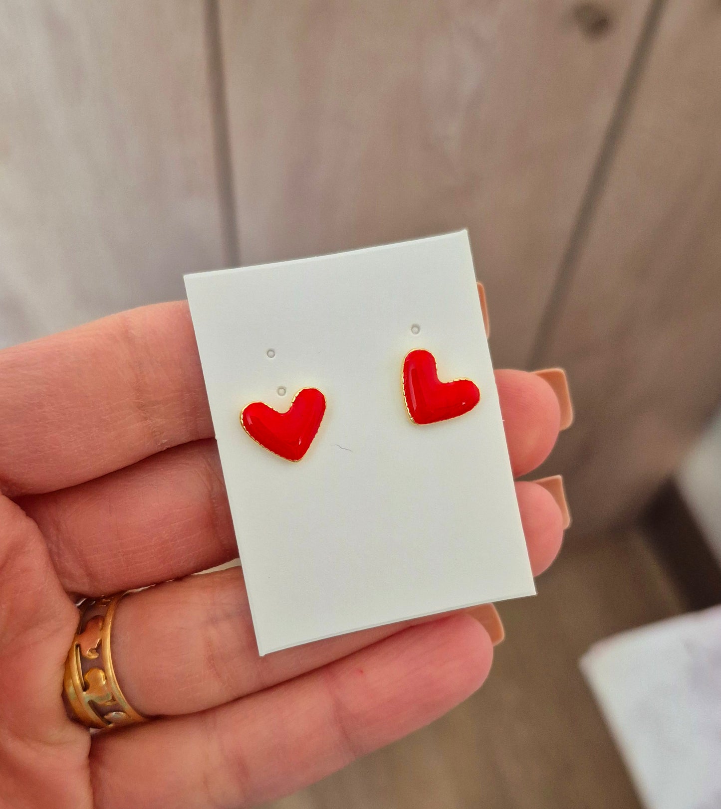 Aros corazones rojos