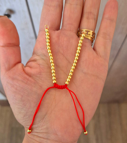 Pulsera conectora hilo rojo