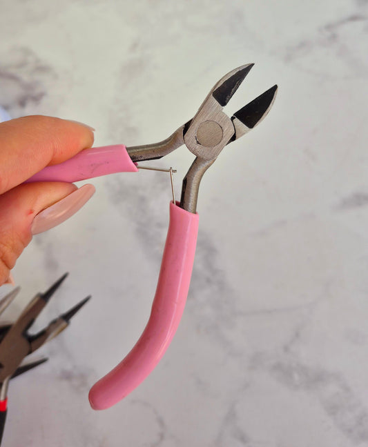 Pinza de corte rosada