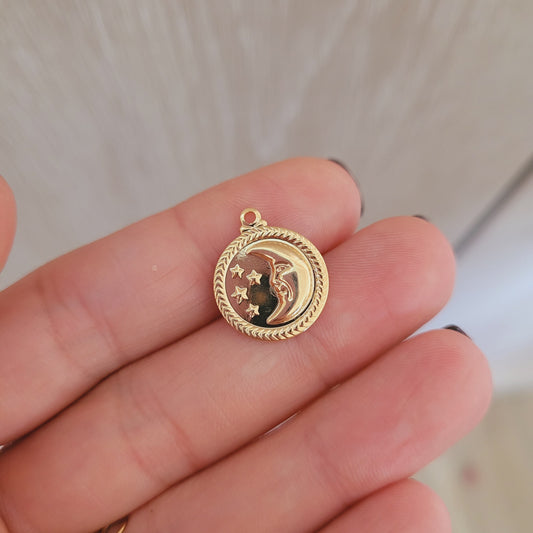 Medalla luna y estrellas