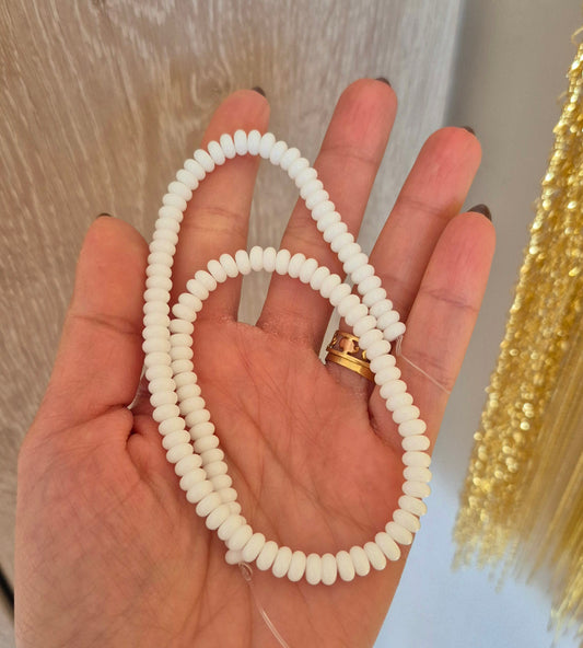 Donitas de vidrio blanco