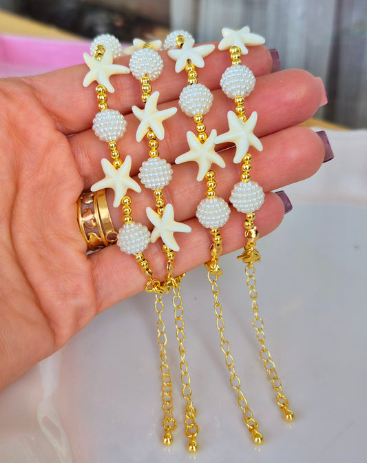 Pulsera estrella de mar y perla