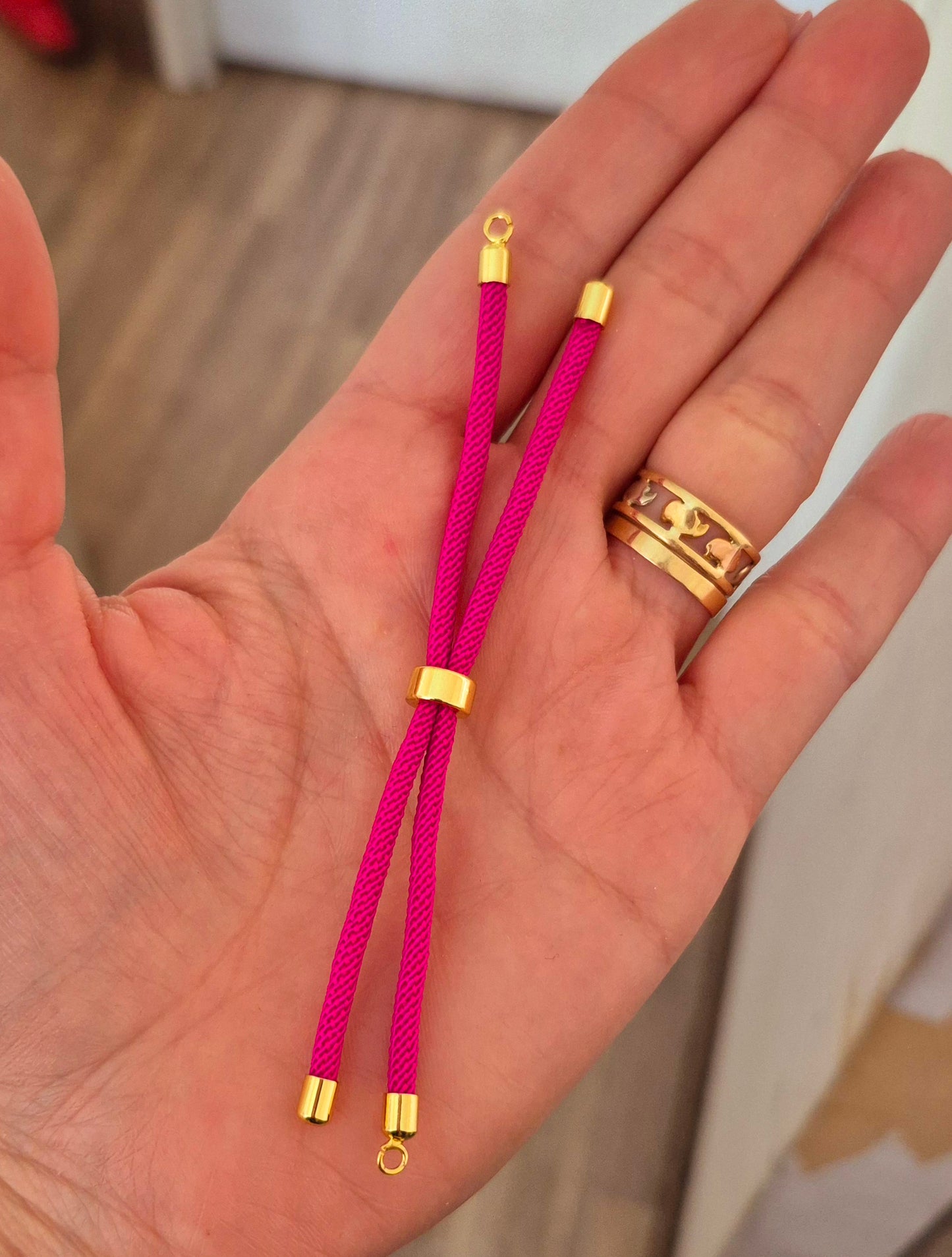 Pulsera cordón conectora fucsia