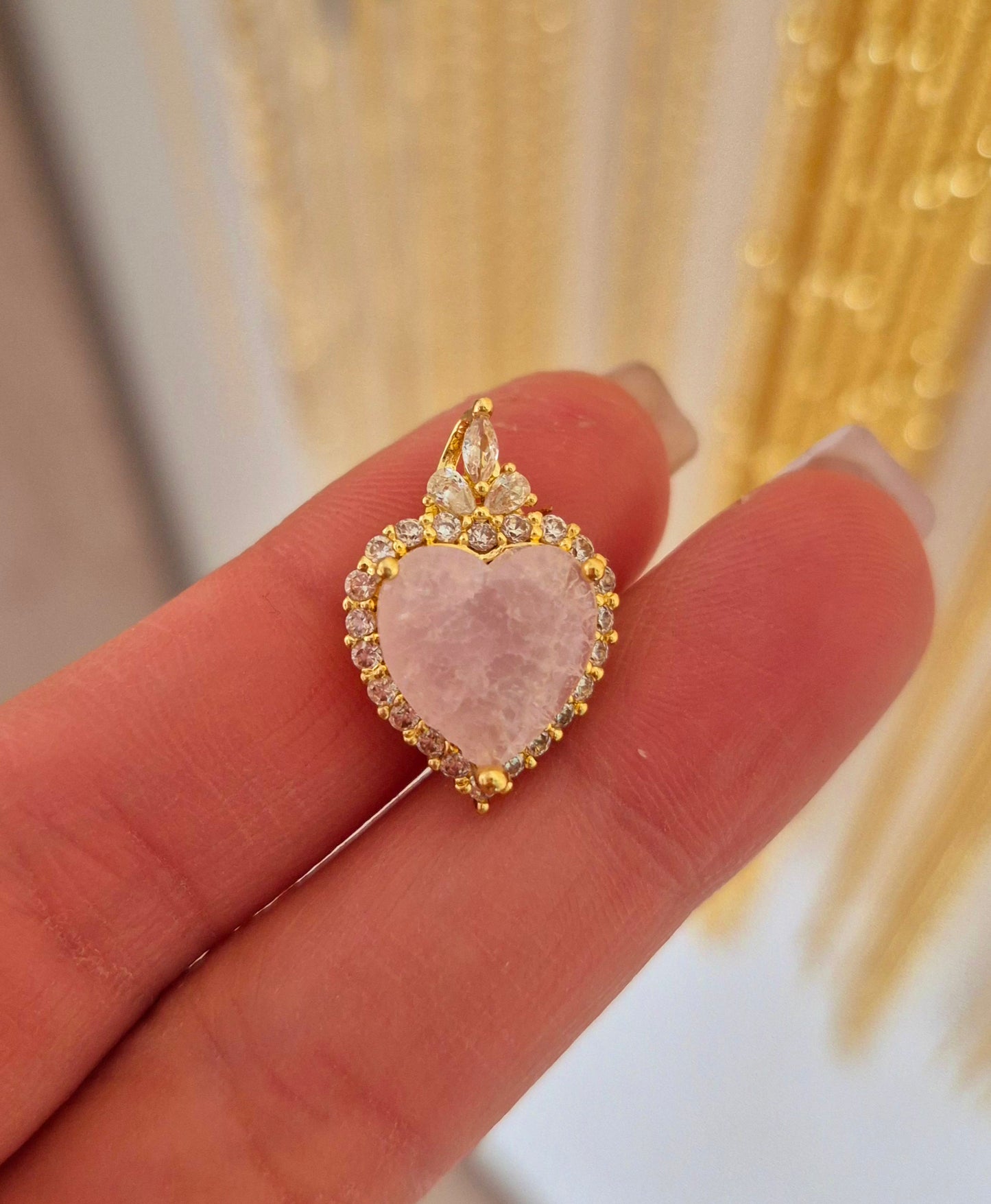 Dije corazón cristal agrietado