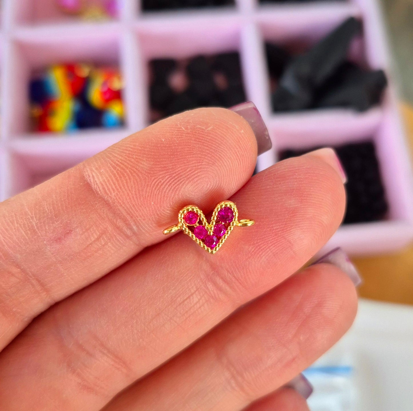 Corazón conector fucsia